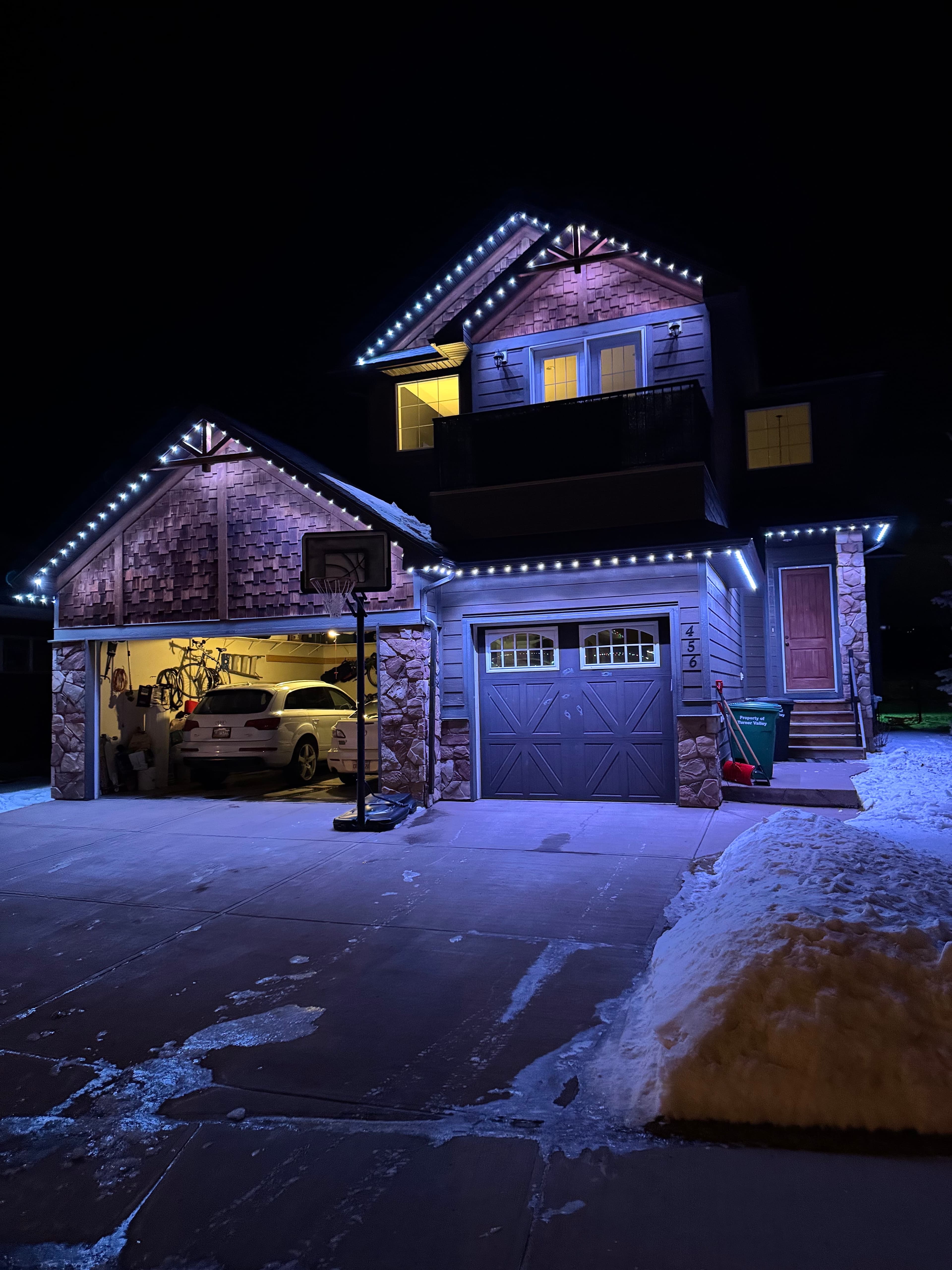 Detailed roofline installation with uniform light spacing and finish.