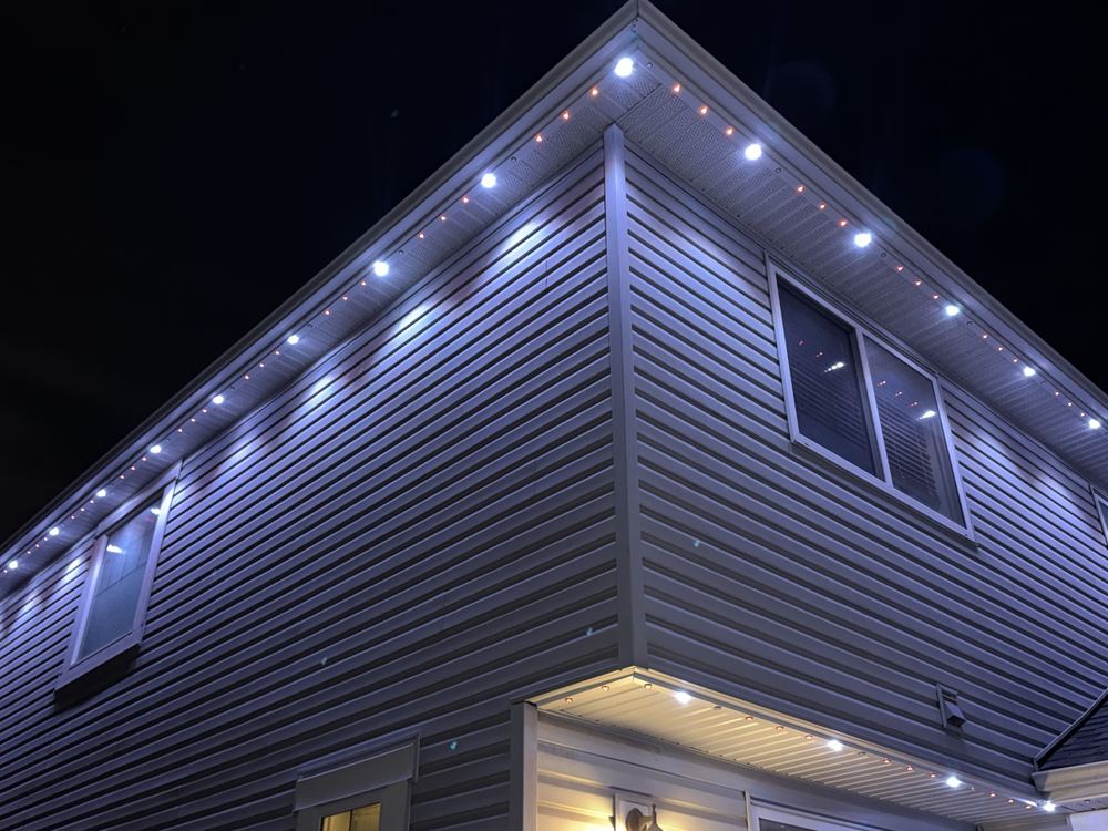 Close-up of Luminair fixtures set flush in colour-matched track along a soffit corner